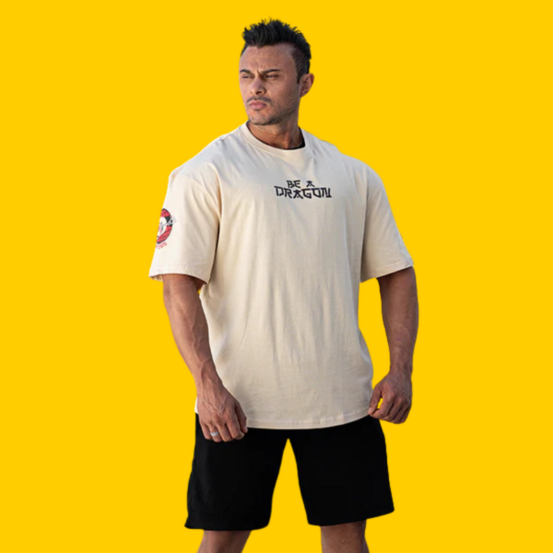 PLAYERA OVERSIZED BE A DRAGON CREMA DRAGON PHARMA