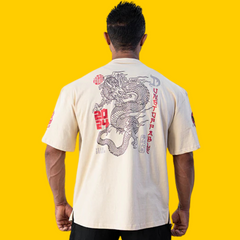 PLAYERA OVERSIZED BE A DRAGON CREMA DRAGON PHARMA