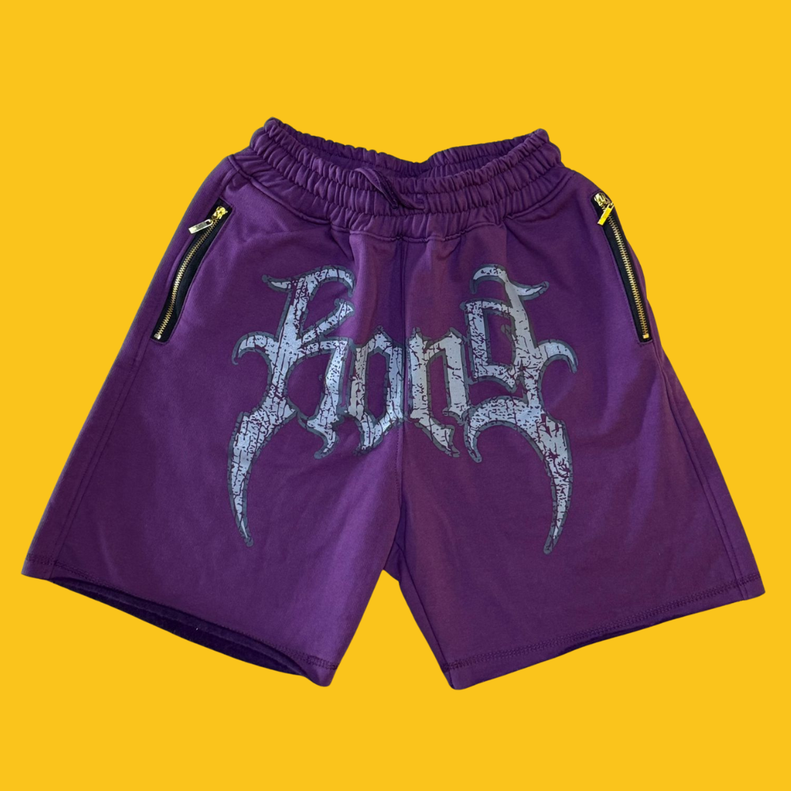 SHORT BERMUDA DE FELPA GOTHIC LOGO KONG MORADO UNITALLA KONG CLOTHING